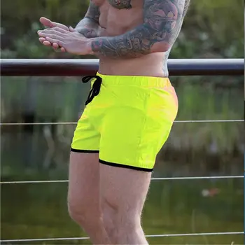 Nyáron új strand férfi alkalmi nadrág háló gyorsan száradó férfi rövidnadrág futó sport nadrág egyszínű nadrág